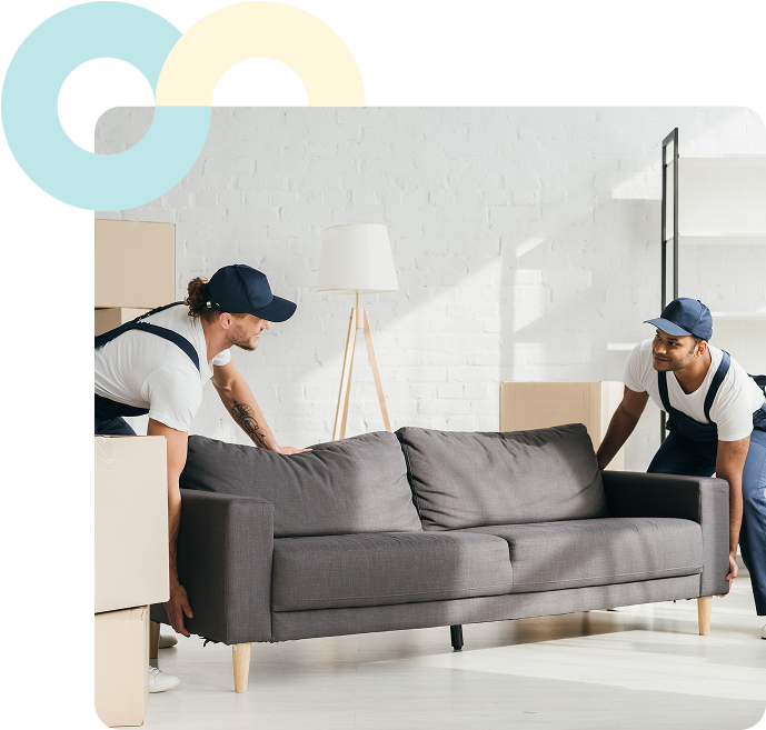 Two movers carrying a sofa
