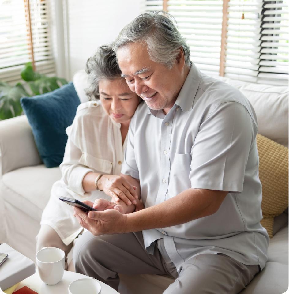 older couple using a smartphone