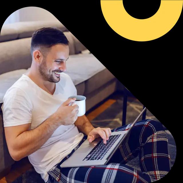 Man with coffee and laptop