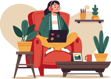 Woman working on a laptop in a chair.