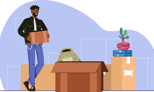 Man carrying a box in a room.