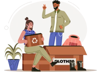 Two people packing a box of clothes.